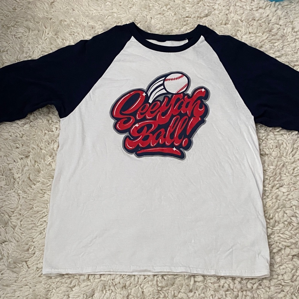 Women’s size LG - XL quarter sleeve baseball Tshirt print reads “seeyah ball!